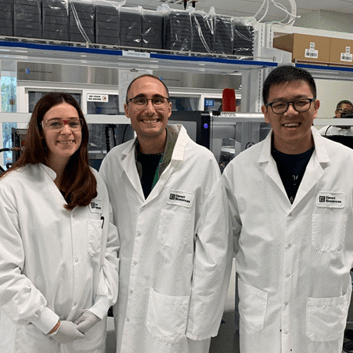 Three Element employees wearing lab coats